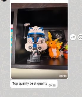 WhatsApp photo of a clone helmet set on a shelf